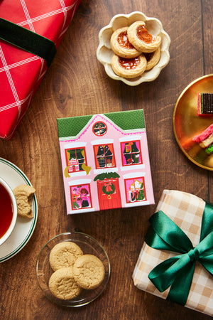 Christmas Eve 100 Piece Mini Puzzle by Ordinary Habit on table