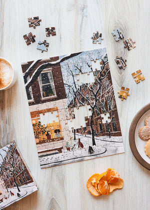 Coffee in the West Village 100 Piece Mini Puzzle by Ordinary Habit on a table