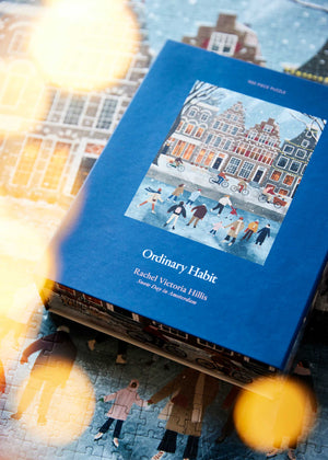 Snow Day in Amsterdam 500 Piece Puzzle by Ordinary Habit holiday lights